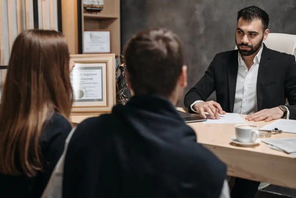 Meeting with a personal injury attorney to discuss a car accident case